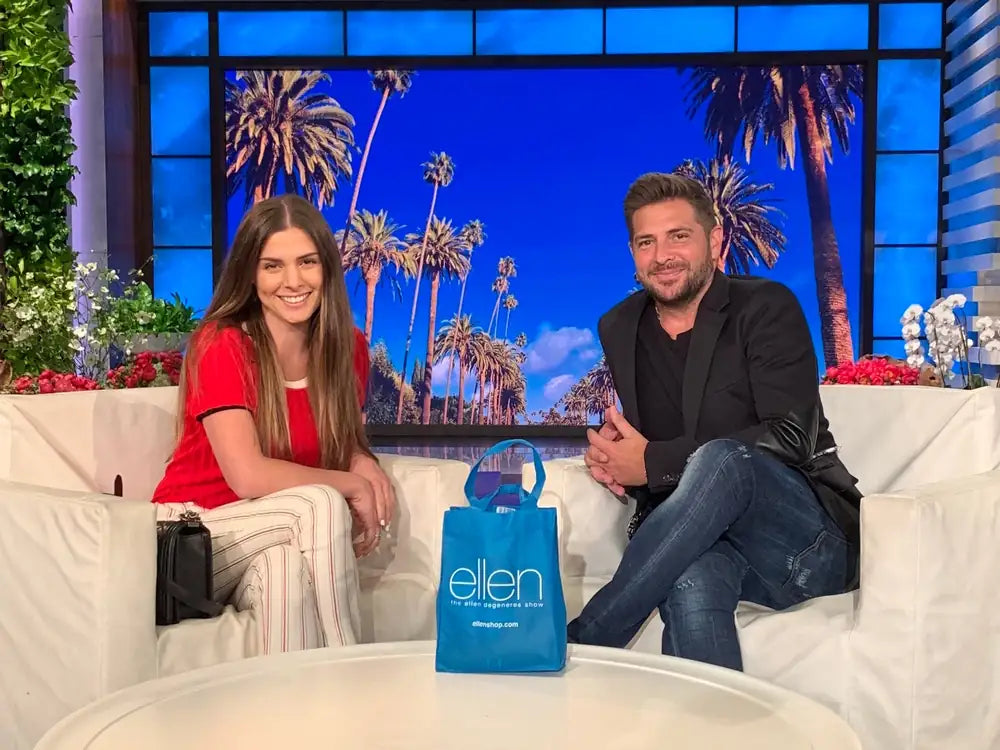 Ready Rocker founders Milena and her husband sitting together on a TV studio set